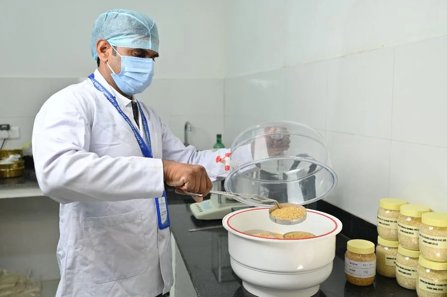 QC lab technician analyzing agro commodity samples